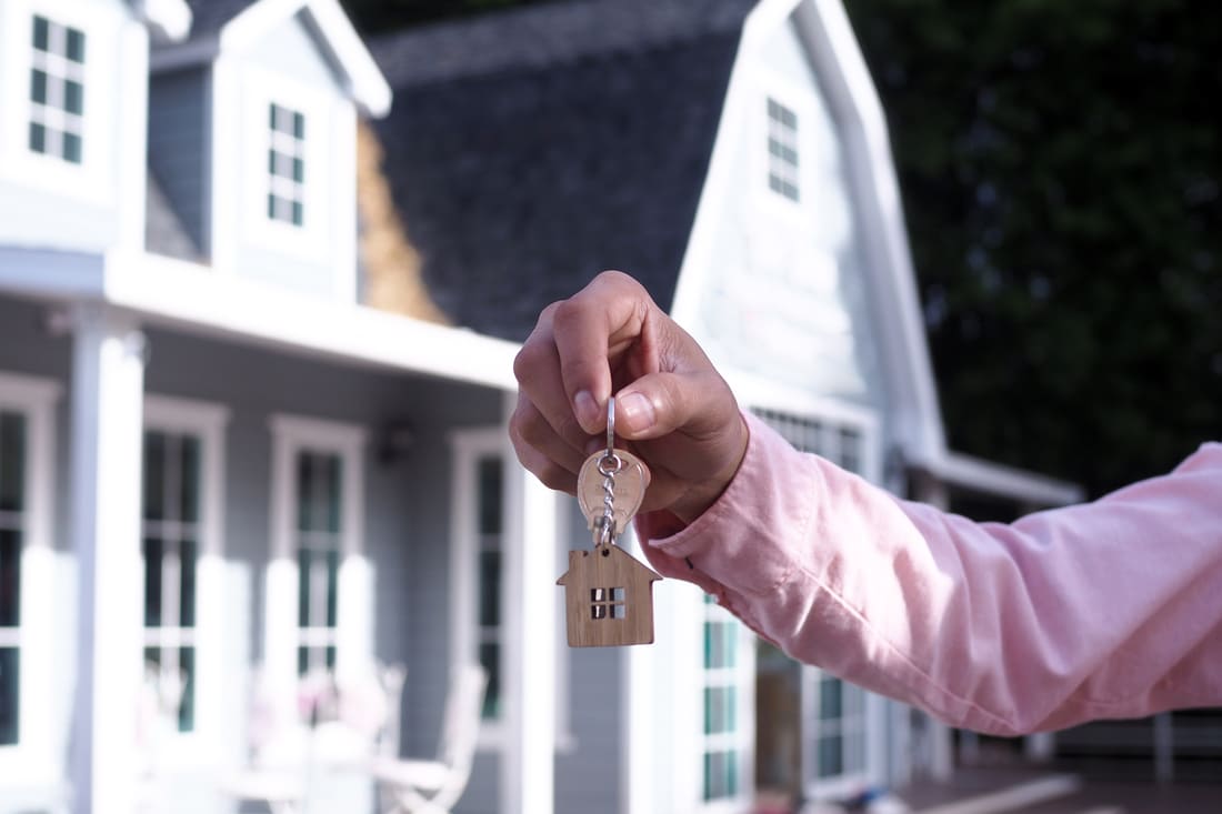 Keys in front of a house